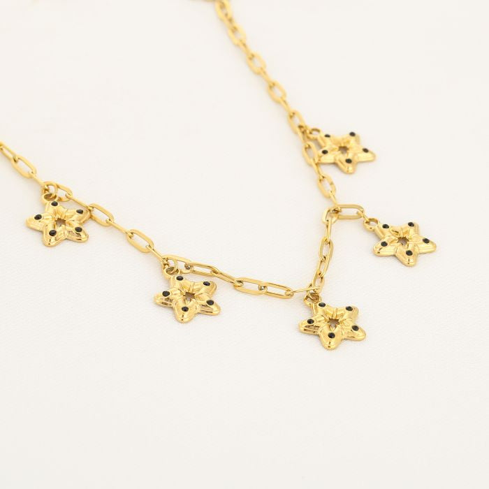 Ster met stippen ketting goud
