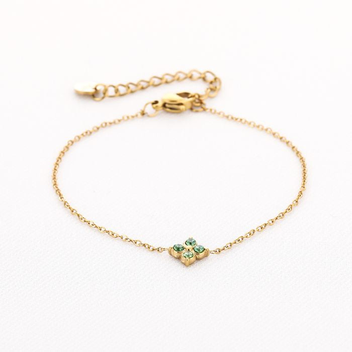 Klaver met groene steentjes armband goud