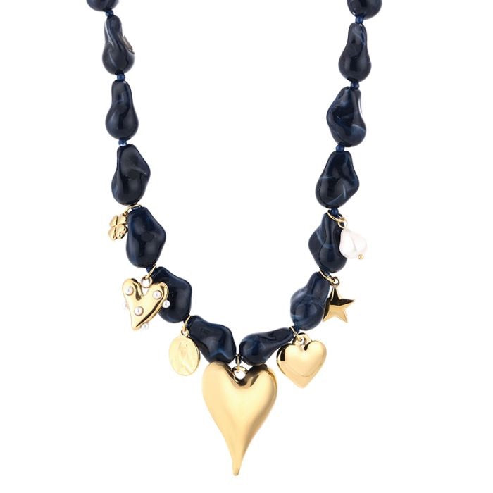 Blauwe kralen ketting met bedels