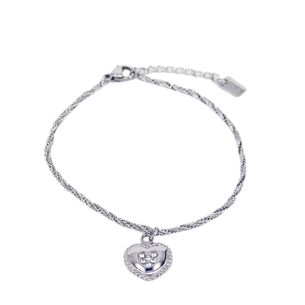 Gedraaide armband met hartjes bedel zilver